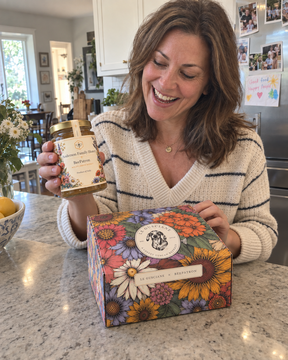 Brooke from Jacksonville holding her personalized BeePatron honey jar and floral gift box